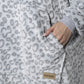 PONCHO CON CAPUCHA CORAL FLEECE GRIS MUJER